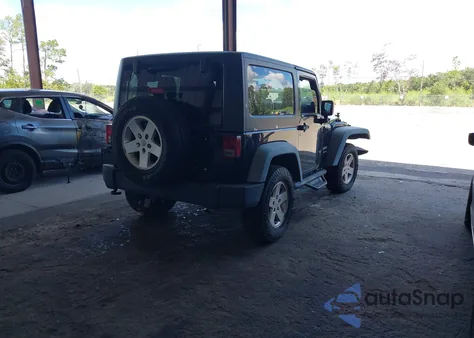 2011 Jeep Wrangler Sport z USA, uszkodzony, nr VIN 1J4AA2D17BL617455